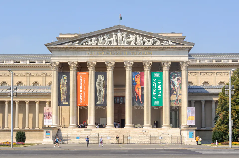 Neoclassical facade of Museum of Fine Arts with grand columns and exhibition banners