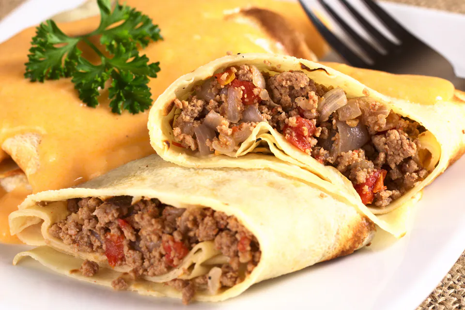 Savory Hungarian palacsinta filled with seasoned ground meat and vegetables