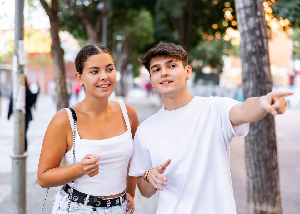 Tourist asking directions in Hungarian from local Budapest resident on street