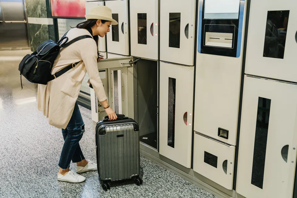 Tourist using a third-party luggage storage service in central Budapest