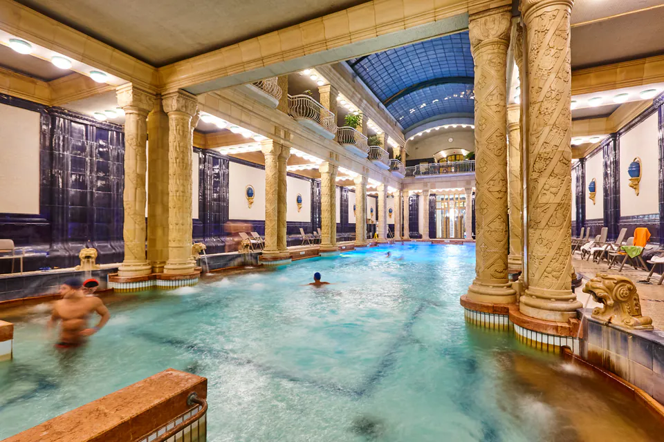 Historic Gellért thermal bath interior with Art Nouveau architecture and thermal pools