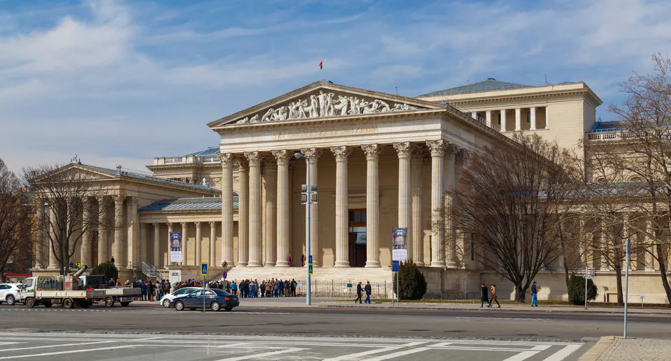 Neoclassical facade of Museum of Fine Arts with grand Corinthian columns and triangular pediment