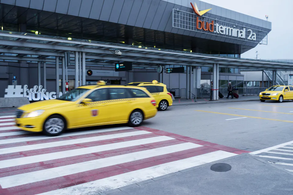 Budapest Airport to City Center: The Local’s Guide to Arriving Smoothly — Taxis & Ride-Hailing: The Yellow Cab Rules