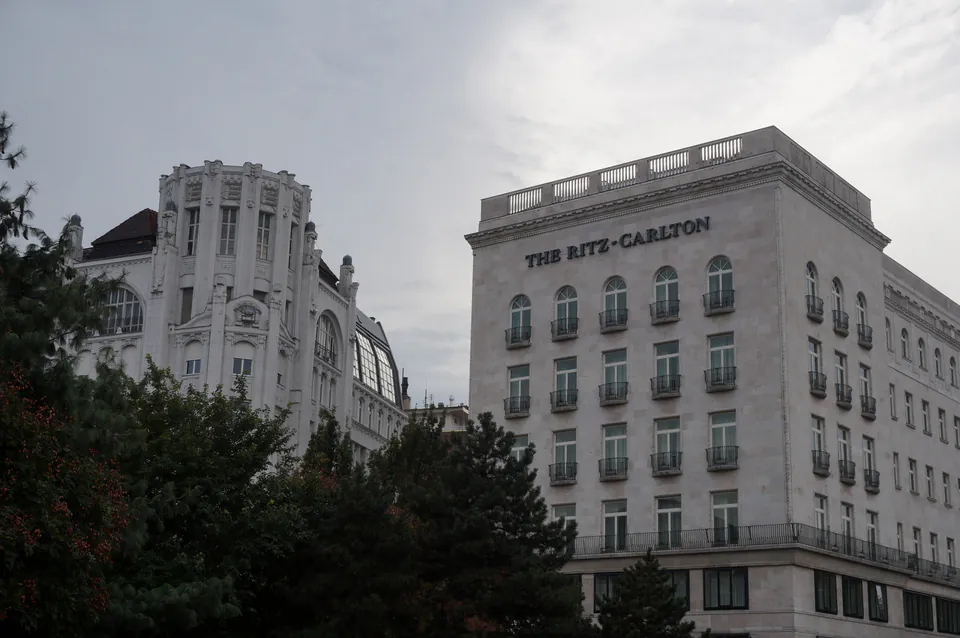 Exterior view of The Ritz-Carlton Budapest's white facade with elegant architectural details