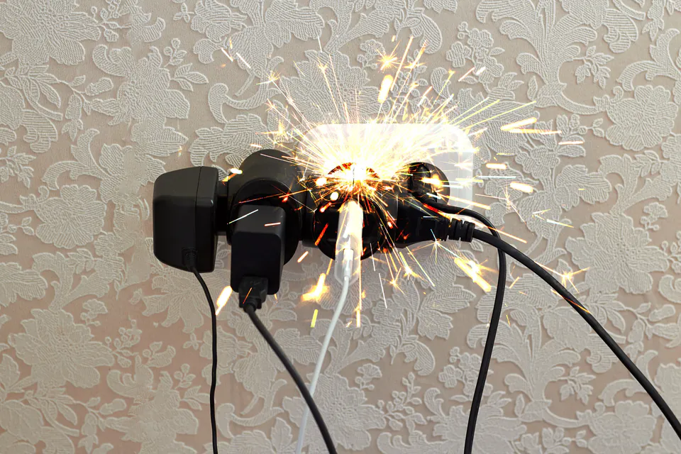 Unsafe daisy-chained adapters showing what not to do