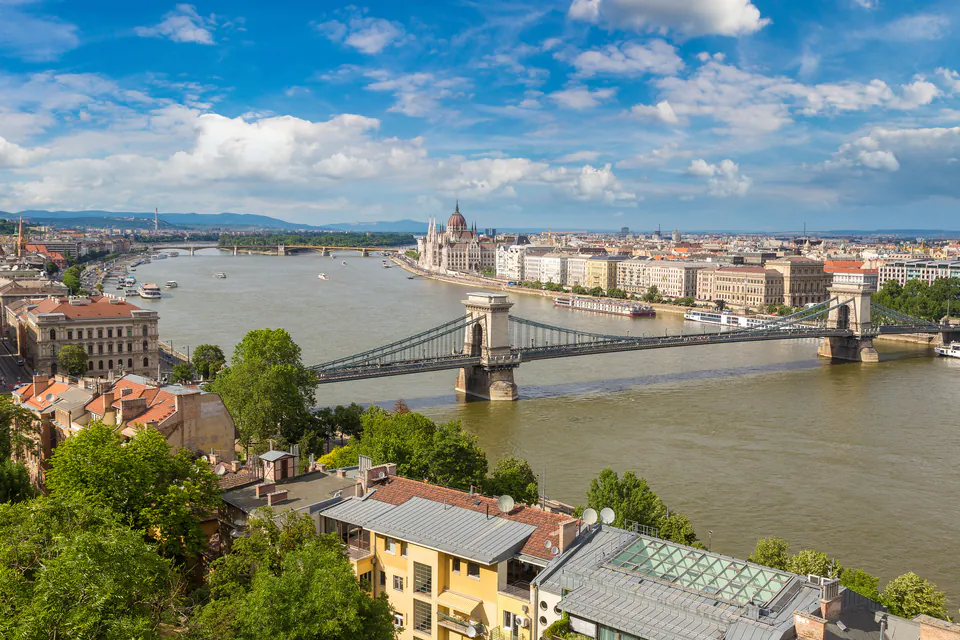 Elevated view of Chain Bridge spanning Danube with Parliament building and Budapest skyline