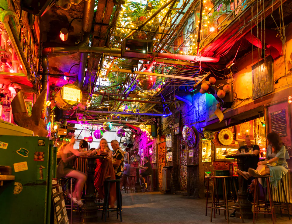 Szimpla Kert ruin bar interior with eclectic furniture and artistic decorations