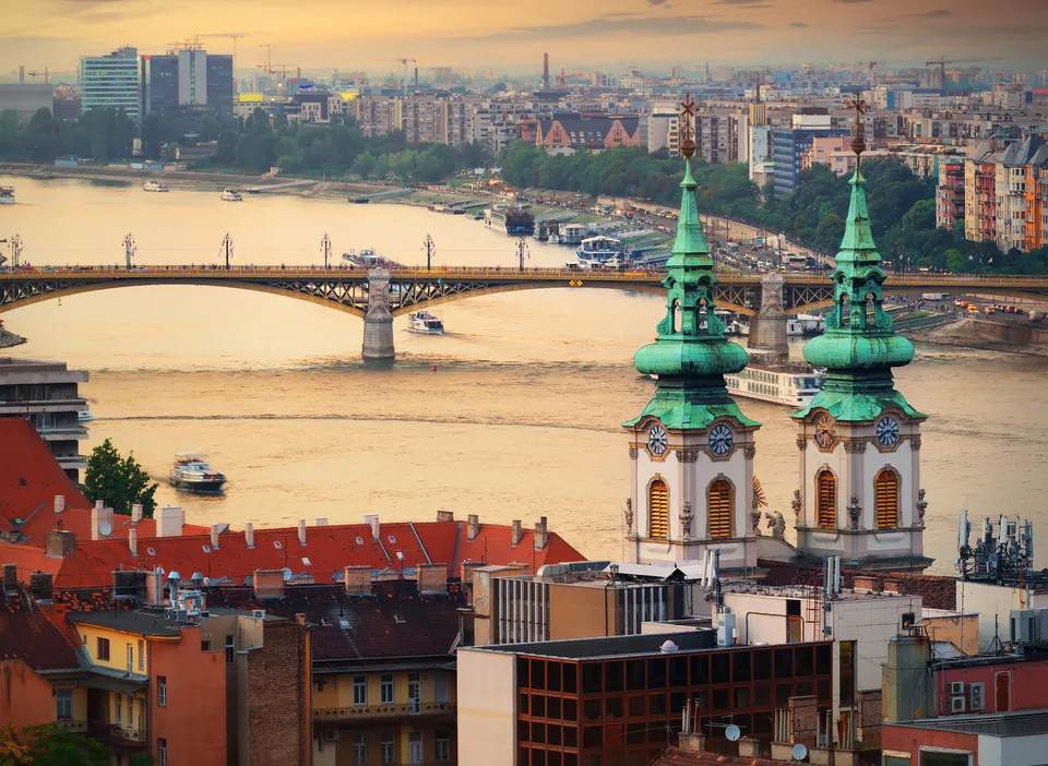 Budapest panoramic view showing Parliament building and Danube River at sunset