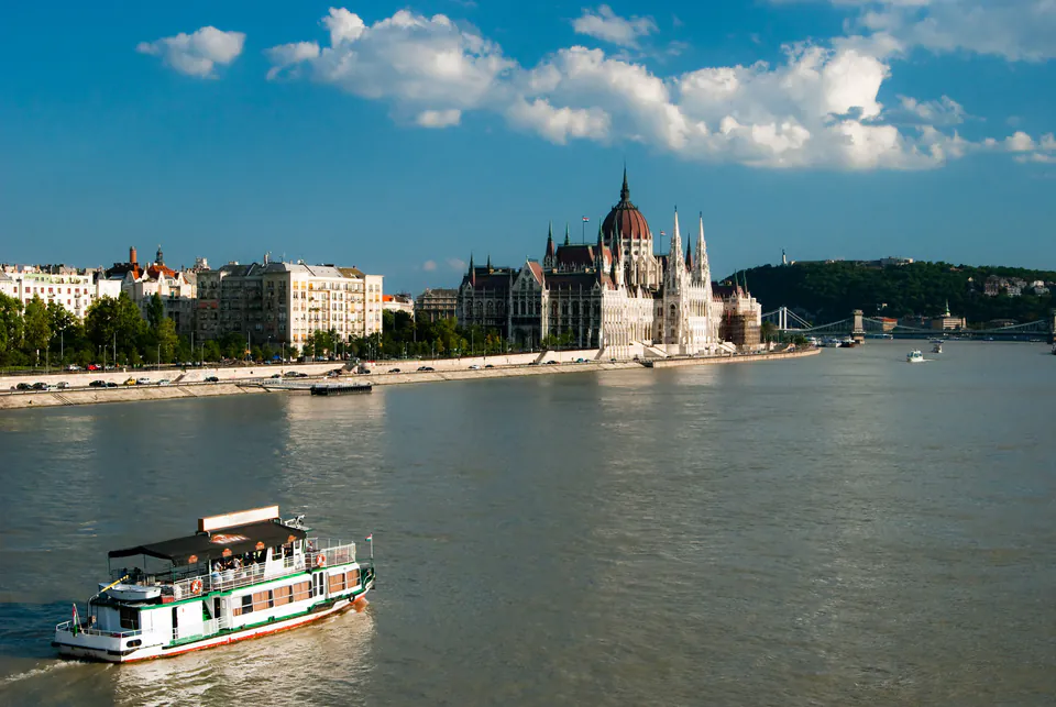 Danube River flowing through Budapest with Parliament building and bridges visible