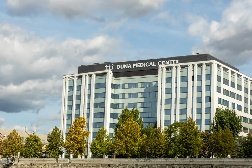 Modern hospital emergency entrance with ambulance bay in Budapest