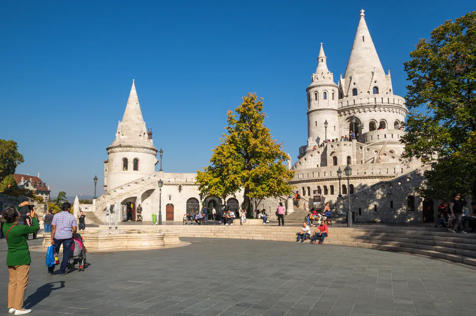 Fisherman's Bastion neo-Romanesque towers overlooking Danube and Parliament building