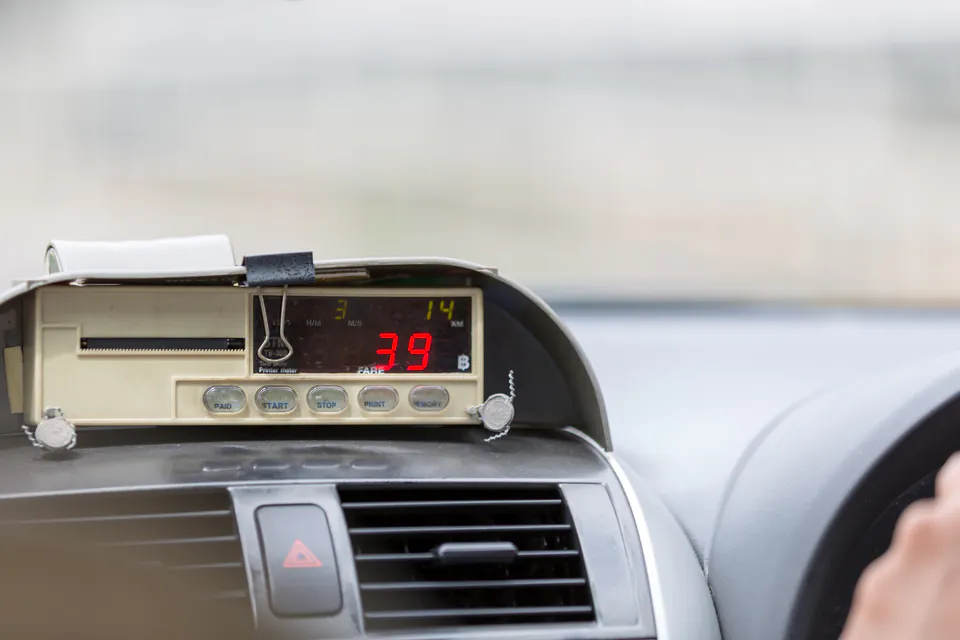 Taxi meter display showing Hungarian forint fare calculation
