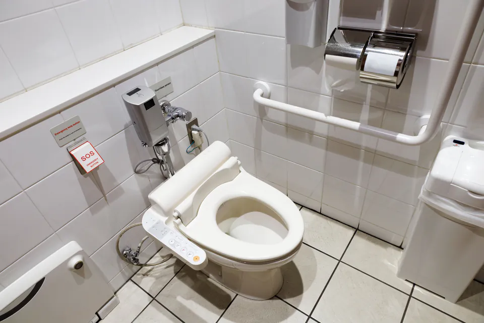 Accessible hotel room with roll-in shower and grab bars in Budapest