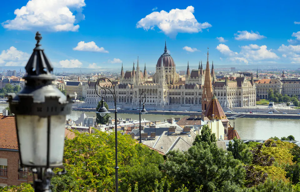 Panoramic view of Budapest showing Buda Castle and Parliament across the Danube