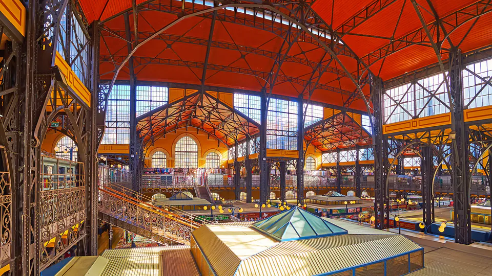 Great Market Hall interior showing colorful food stalls and Gothic architecture