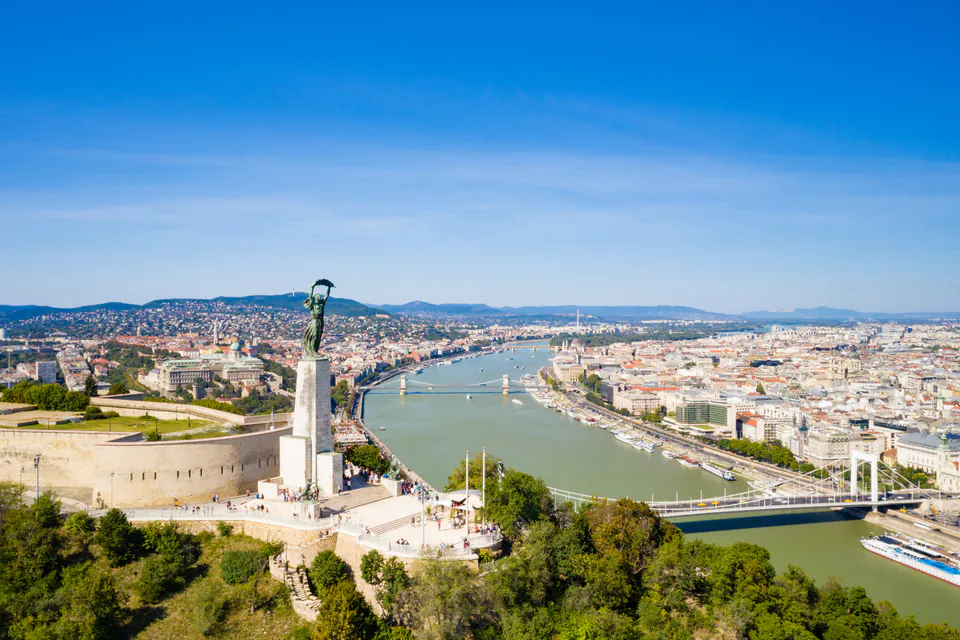 Liberty Statue on Gellért Hill overlooking Budapest cityscape and Danube River