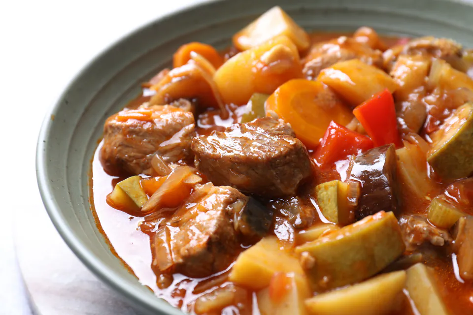 Traditional Hungarian goulash with tender beef, potatoes and vegetables in rich paprika broth
