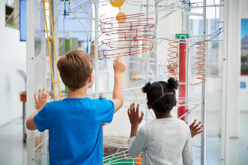 Children experimenting at the Palace of Wonders interactive science center