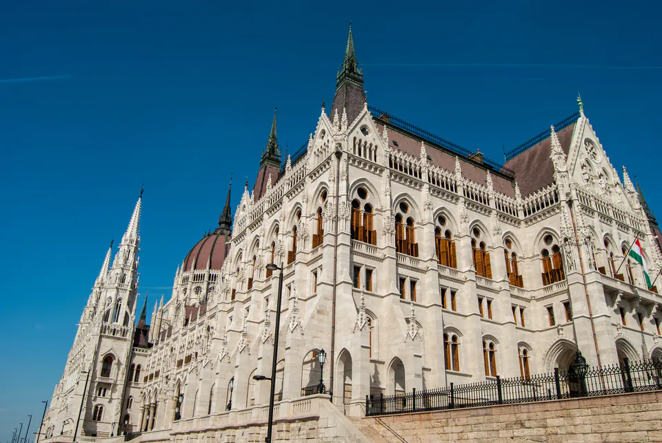 Close-up of Hungarian Parliament's Gothic Revival facade showing ornate stone details and spires