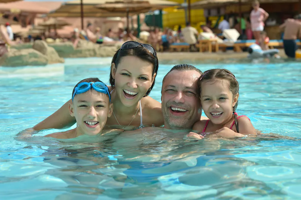 Family enjoying water slides and pools at Palatinus Strand water park