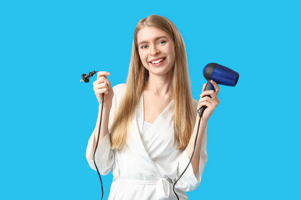 Travel-sized dual voltage hair dryer